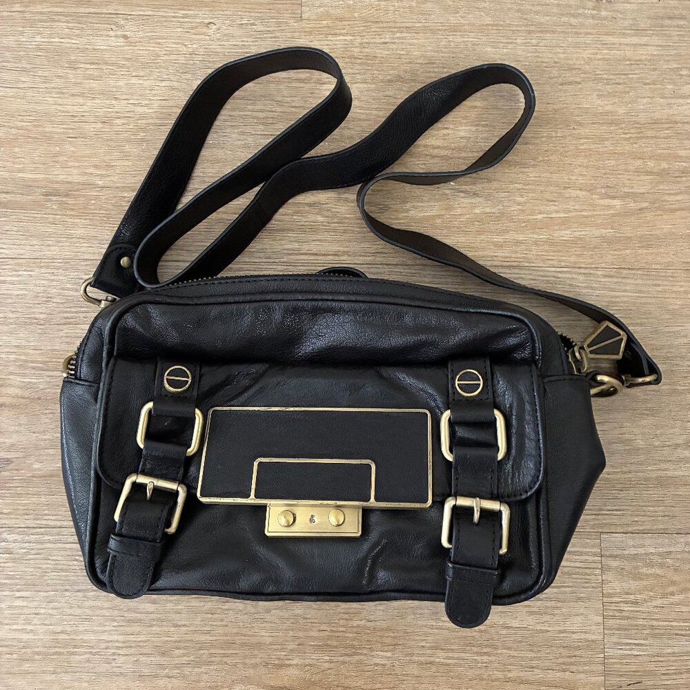 Treesje black leather crossbody bag with lock and key detail